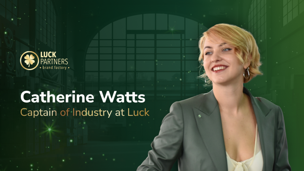 Catherine Watts, Head of Affiliates at Luck Partners, smiling in a green suit jacket against a stylized green factory backdrop with the Luck Partners logo and the title “Head of Affiliates at Luck Partners.”